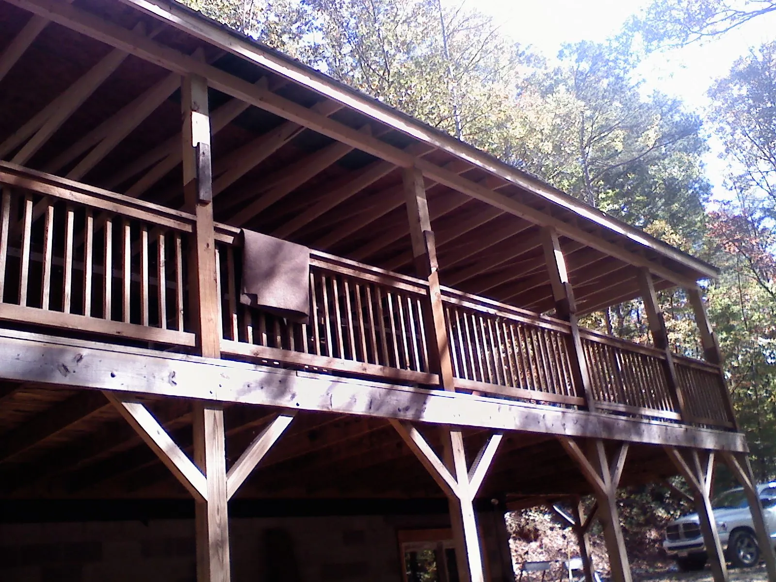 Timber framing under a new elevated porch and deck — Roof Leak Repair in Leonidas by Roofing Brothers